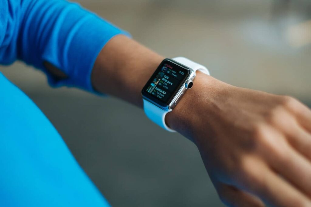 person wearing smart watch - Fourwall Magazine